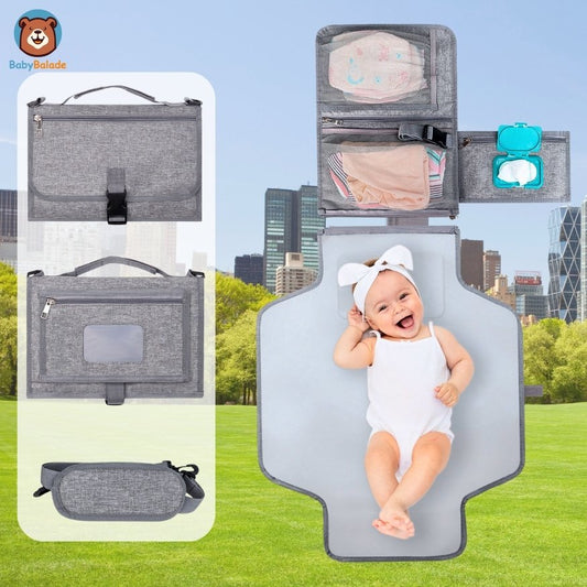 Tapis à langer - bébé dans un parc