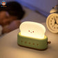 veilleuse bébé - sur la table de nuit allumée