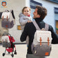 sac à dos à langer - bébé et papa en balade avec la poussette