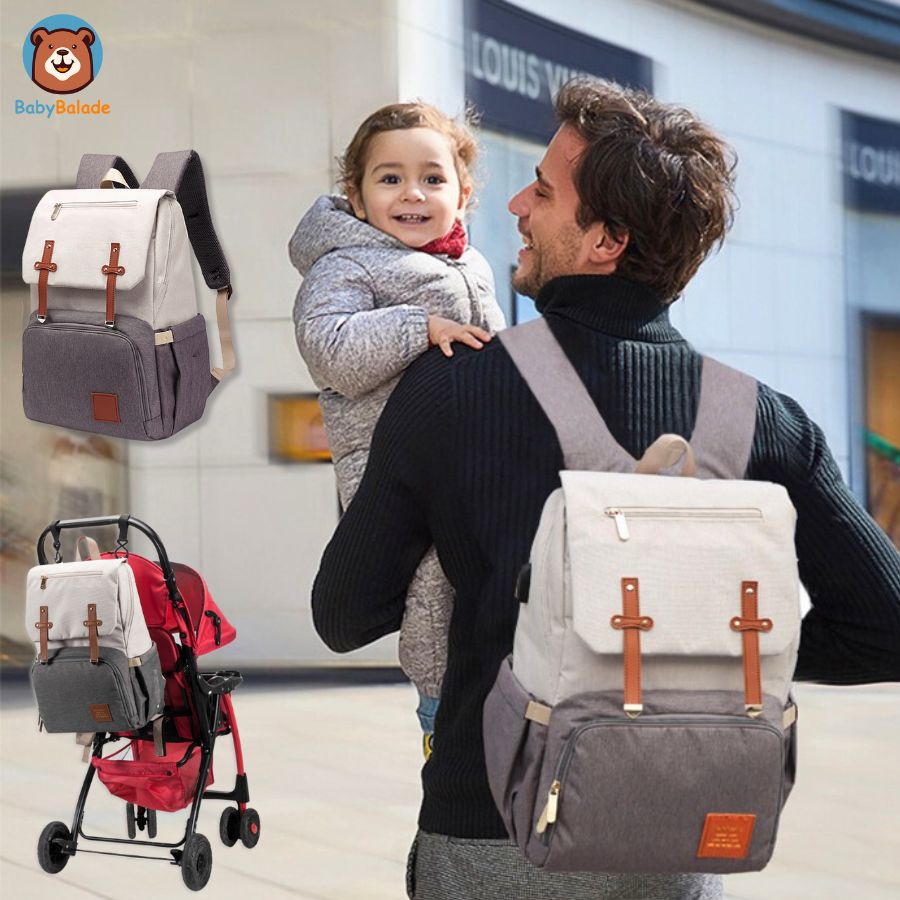 sac à dos à langer - bébé et papa en balade avec la poussette