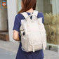 sac à dos à langer sur le dos de maman