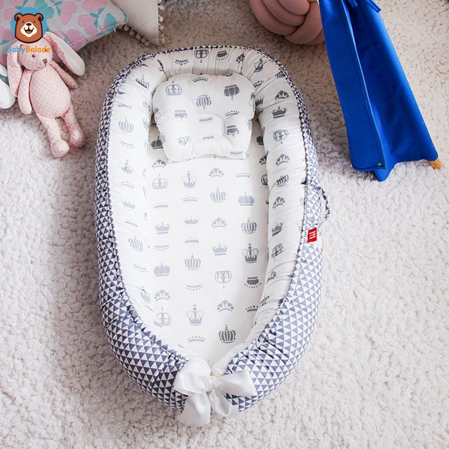 réducteur de lit bébé - bleu