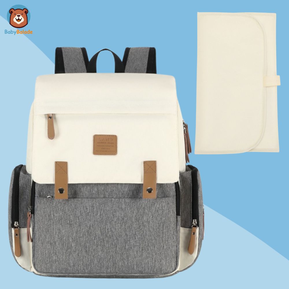 sac à dos à langer gris crème avec tapis à langer beige