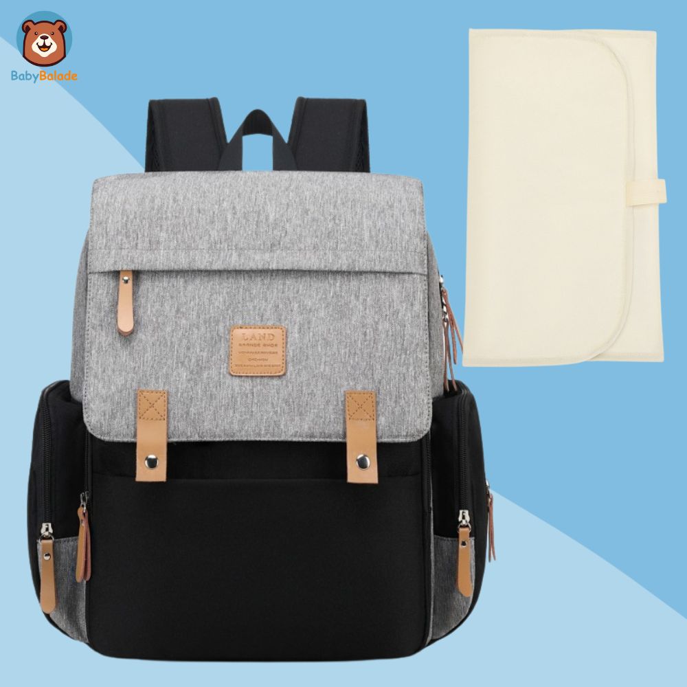 sac à dos à langer noir gris avec tapis à langer beige